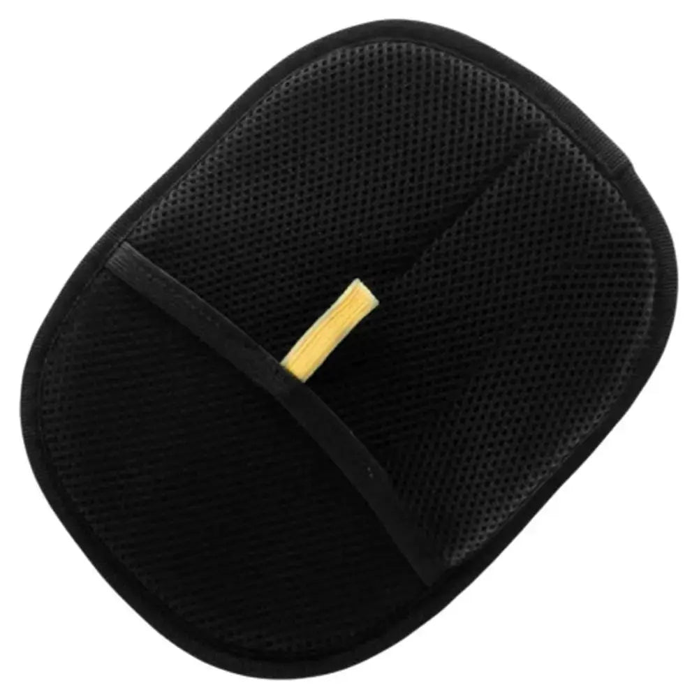 Black cat hair removal glove with a yellow label on a white background