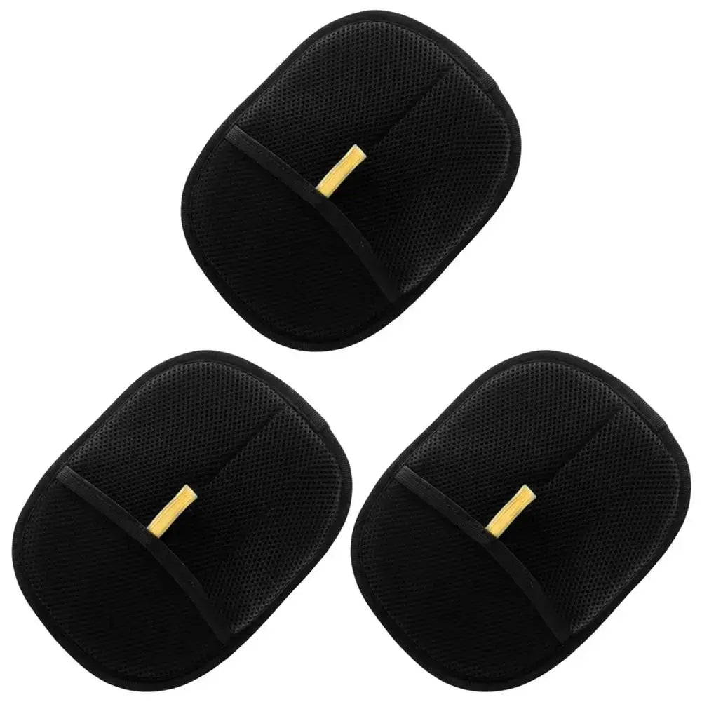 Three cat hair removal gloves with gold accents on a white background