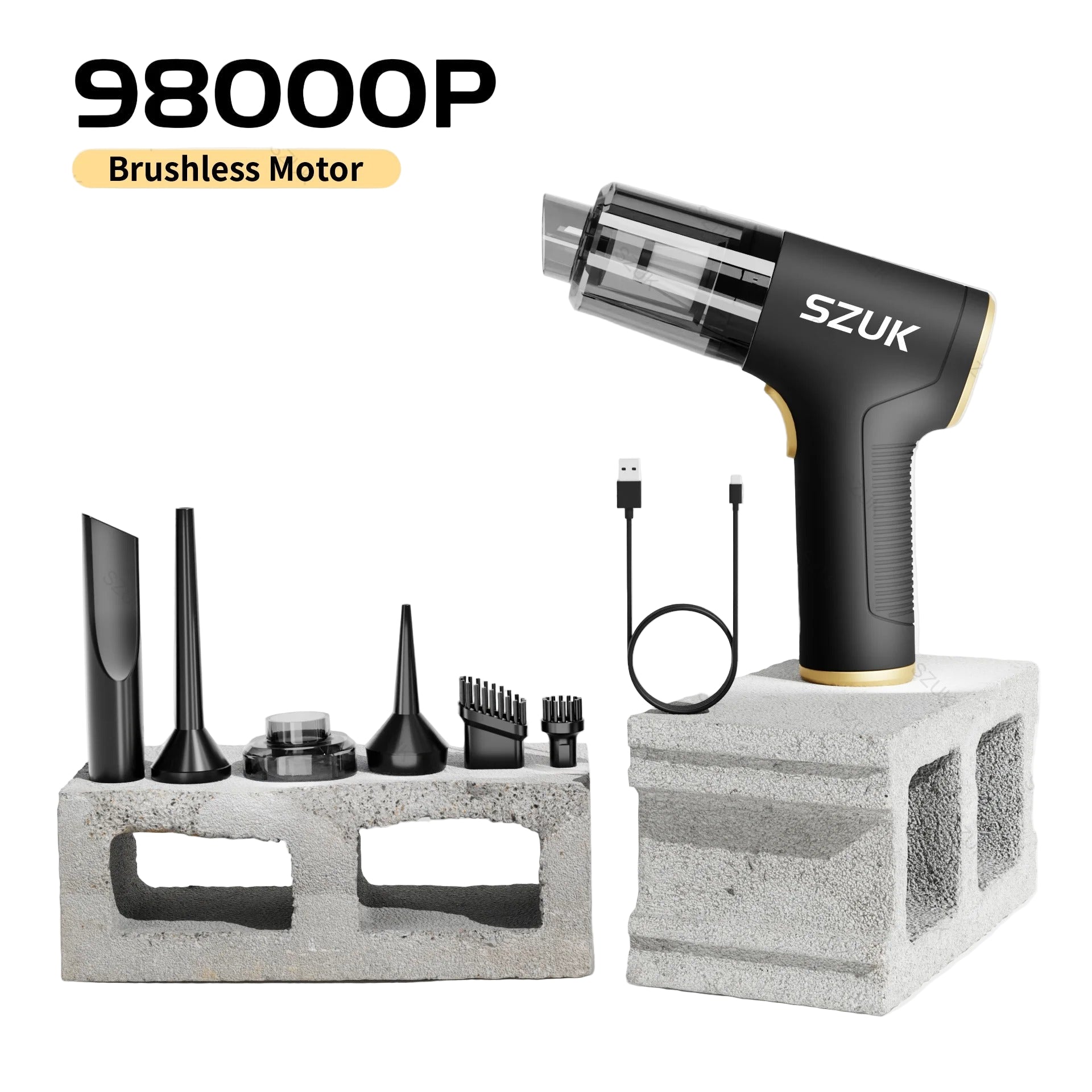 car mini vacuum cleaner with attachments on a concrete block against a light gray background