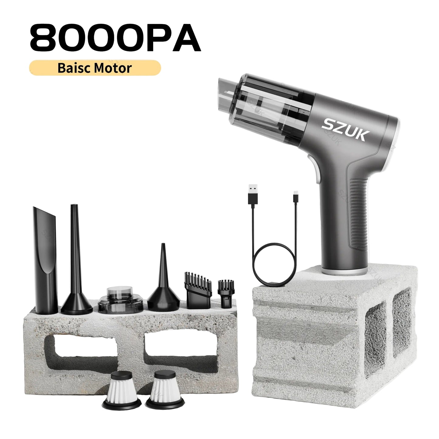 car mini vacuum cleaner with attachments on a concrete block against a light background